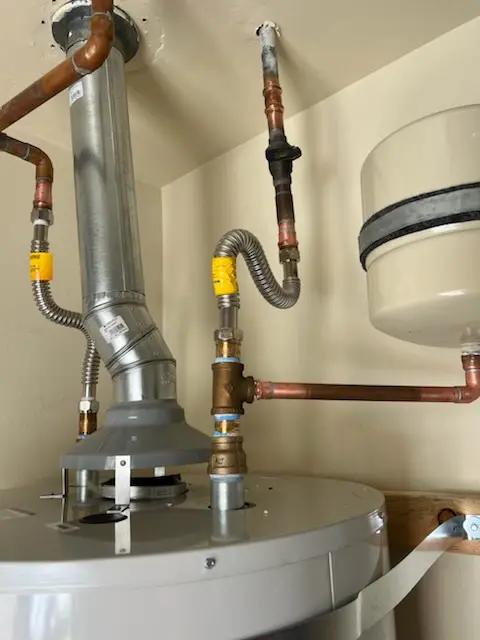 Water heater installation and plumbing repair in Pinewood Village